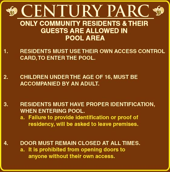 sign indicating several rules in the pool area